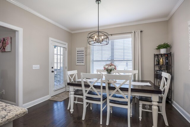 dining space featuring dark wood finished floors, an inviting chandelier, and baseboards