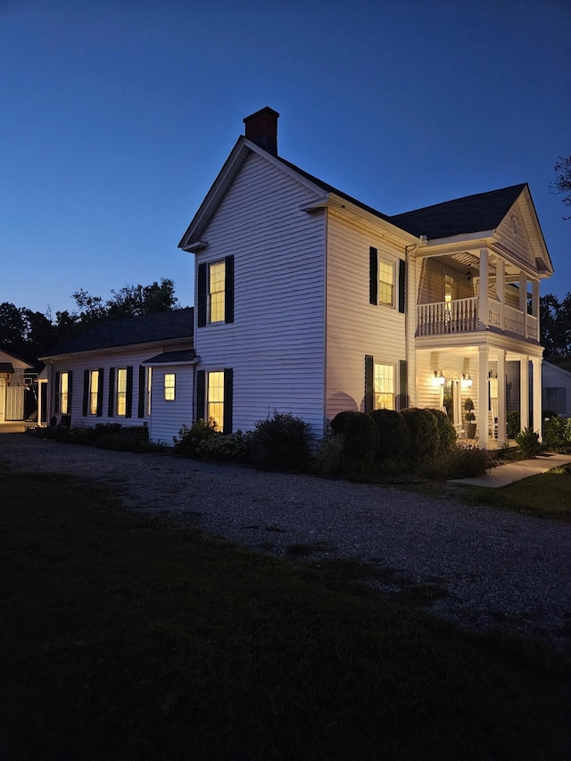 view of home's exterior featuring a balcony