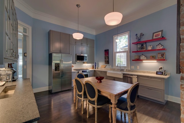 dining space featuring baseboards, dark wood-type flooring, and ornamental molding