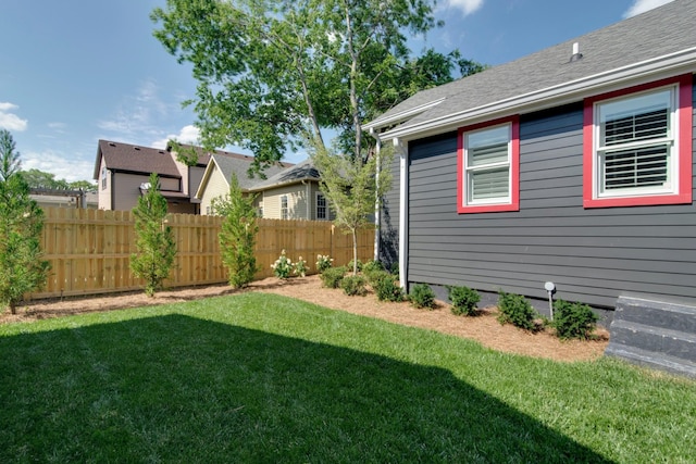 view of yard with fence