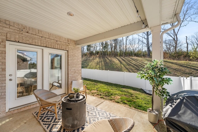 view of patio with fence