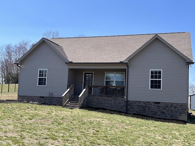 view of front of home featuring crawl space, covered porch, a front lawn, and a shingled roof