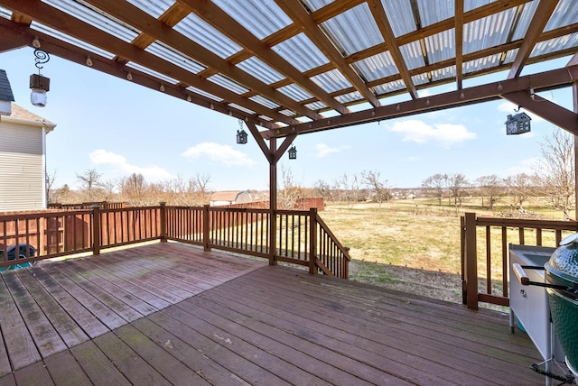 deck featuring a pergola and a grill