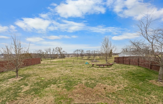 view of yard featuring fence