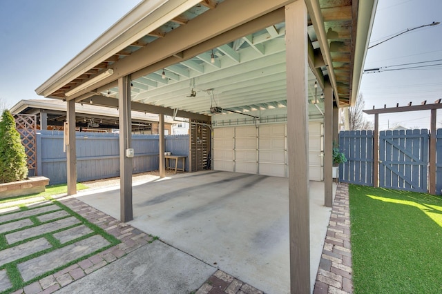 view of patio / terrace featuring a carport and fence