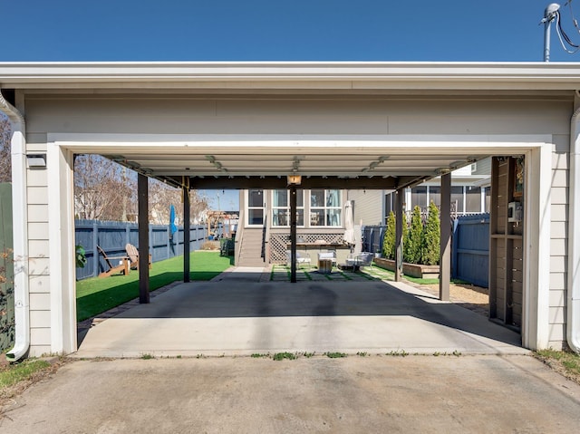 garage with fence