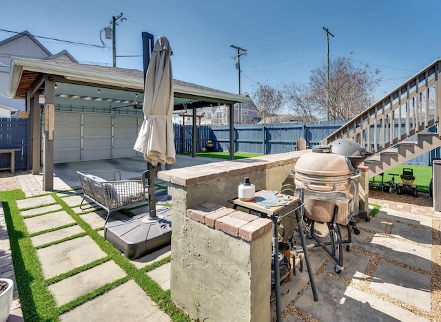 view of patio / terrace featuring fence