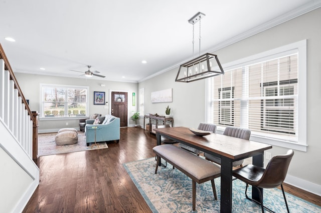 dining room with crown molding, baseboards, dark wood finished floors, stairway, and recessed lighting