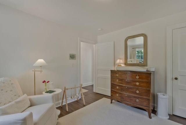 sitting room featuring wood finished floors