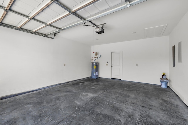 garage featuring a garage door opener and electric water heater