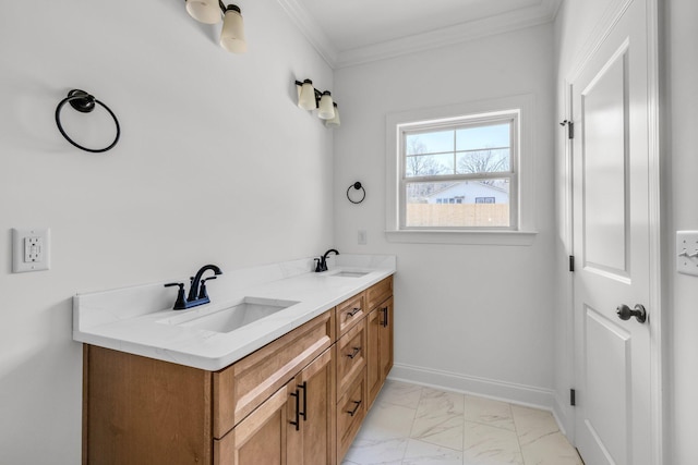 bathroom with crown molding, baseboards, marble finish floor, and a sink