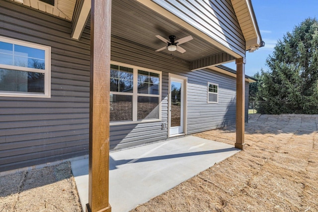 view of patio featuring ceiling fan