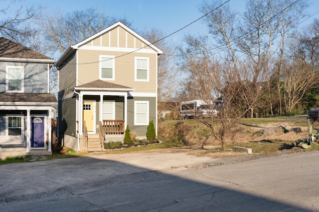 view of front of house featuring roof with shingles