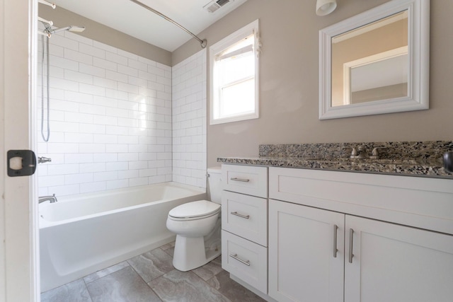 full bath with visible vents, vanity, toilet, and  shower combination