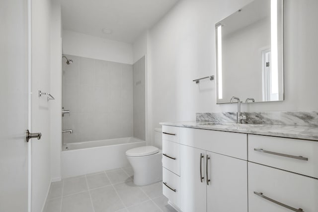 full bath with tile patterned floors, toilet, vanity, and bathing tub / shower combination