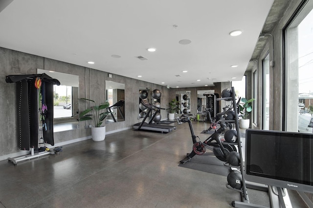 workout area featuring recessed lighting and visible vents