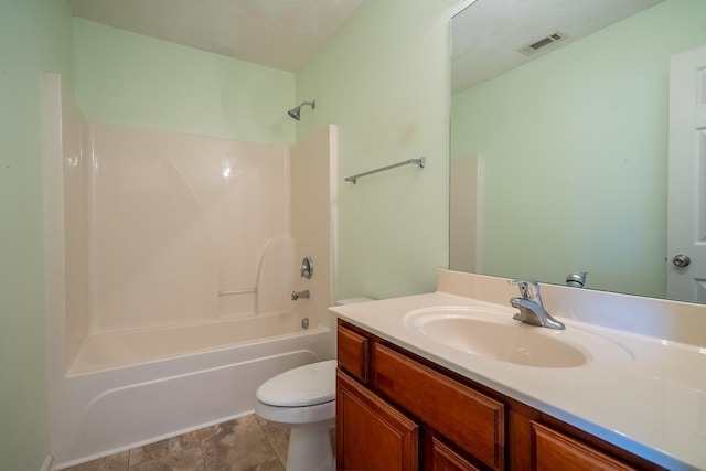 bathroom with tile patterned flooring, visible vents, toilet, bathing tub / shower combination, and vanity