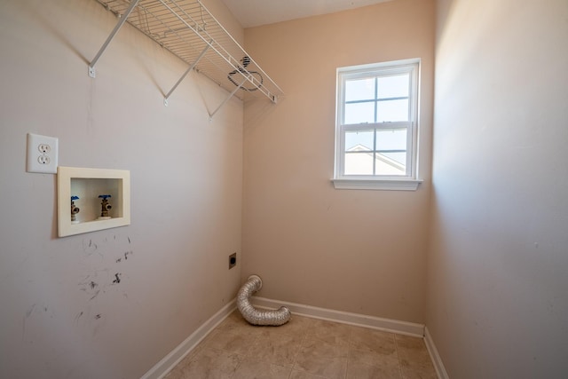 laundry area featuring baseboards, hookup for an electric dryer, hookup for a washing machine, and laundry area