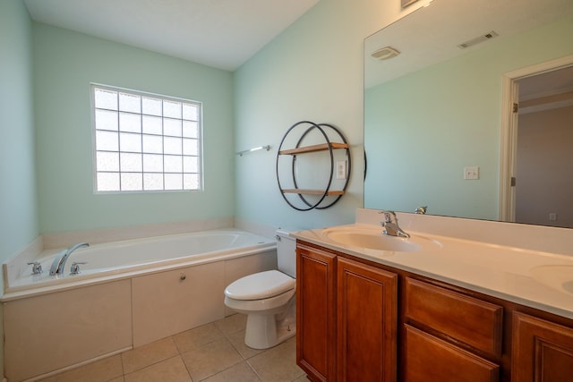 bathroom featuring visible vents, toilet, a garden tub, tile patterned floors, and a sink