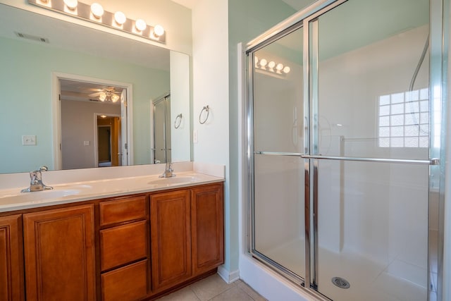 full bathroom featuring a sink, visible vents, and an enclosed shower