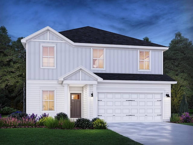 view of front of house with concrete driveway, an attached garage, board and batten siding, and a front lawn