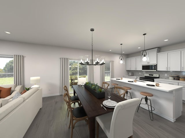 dining area with recessed lighting, a chandelier, baseboards, and dark wood finished floors