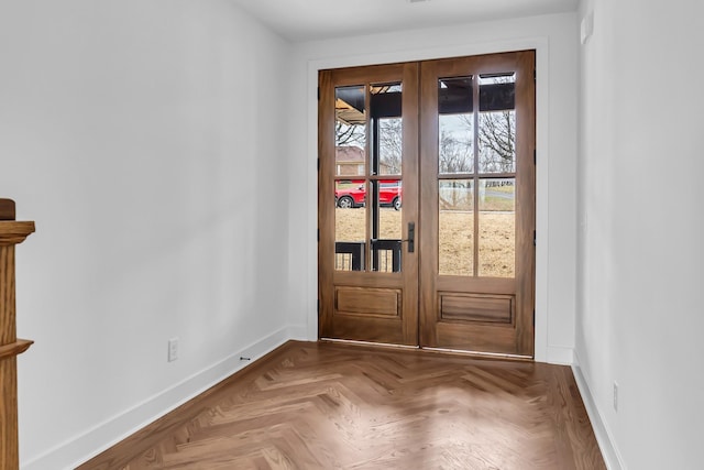 entryway featuring french doors and baseboards