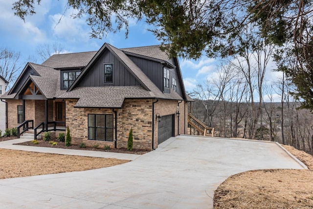 view of front facade featuring an attached garage, board and batten siding, driveway, and a shingled roof