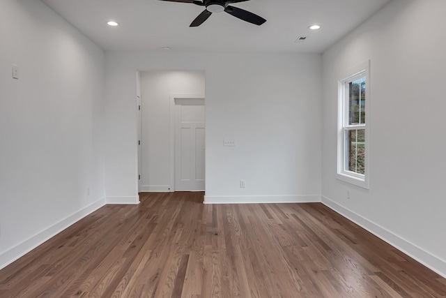 unfurnished room with recessed lighting, ceiling fan, baseboards, and wood finished floors