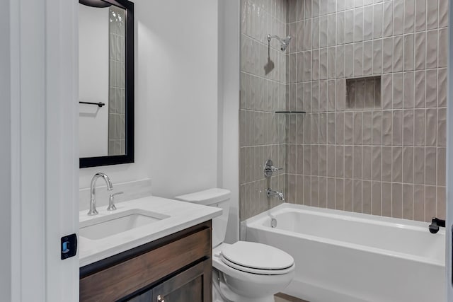 full bath featuring vanity, toilet, and shower / bathtub combination