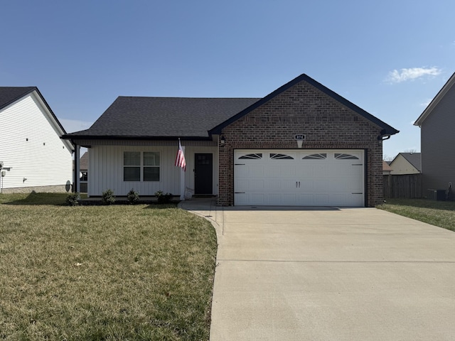 ranch-style house with central air condition unit, driveway, a front yard, an attached garage, and brick siding