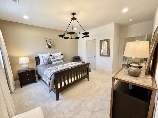 bedroom with a chandelier, recessed lighting, light colored carpet, and baseboards