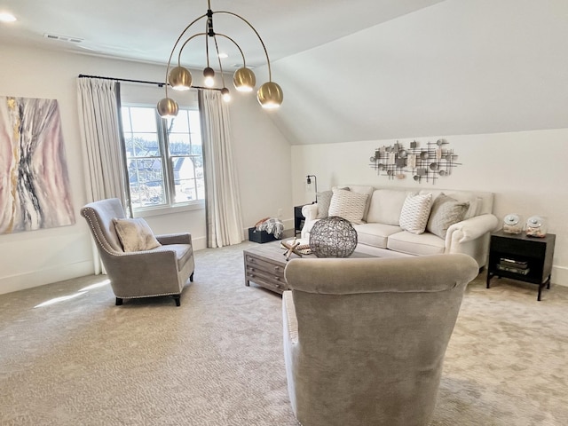 carpeted living room featuring a notable chandelier, visible vents, baseboards, and vaulted ceiling