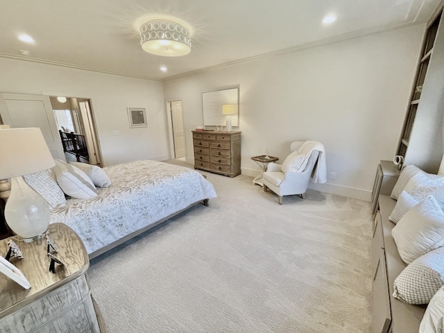 carpeted bedroom with visible vents, recessed lighting, baseboards, and ornamental molding