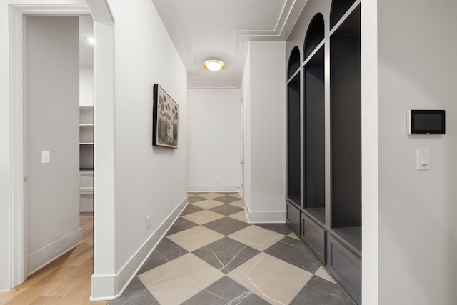 hallway featuring baseboards