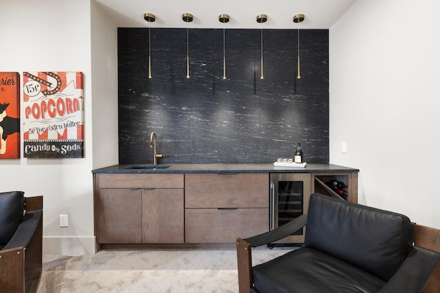 bar with a sink, decorative backsplash, wet bar, and wine cooler