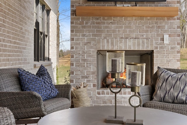 exterior space featuring an outdoor brick fireplace