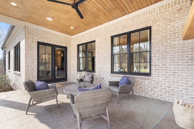 view of patio / terrace featuring french doors and ceiling fan