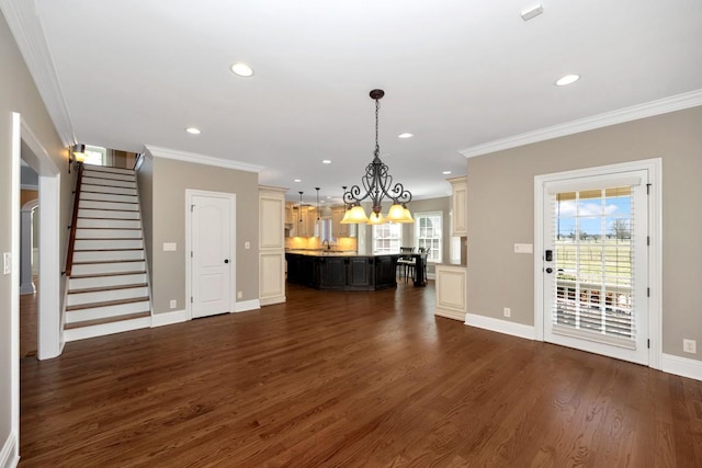 unfurnished living room featuring crown molding, stairway, dark wood-style floors, and baseboards