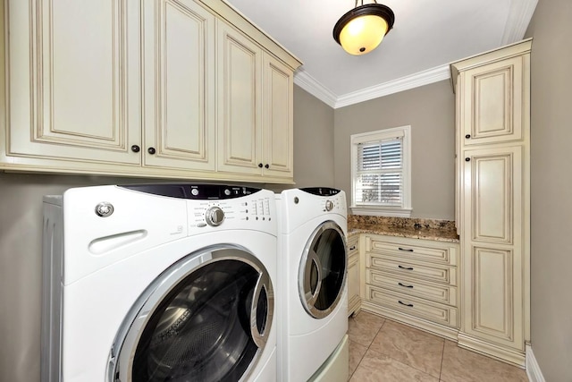 clothes washing area with cabinet space, light tile patterned floors, independent washer and dryer, and crown molding