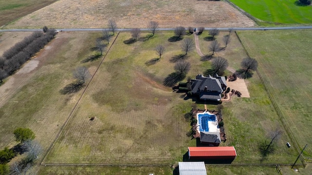 birds eye view of property featuring a rural view