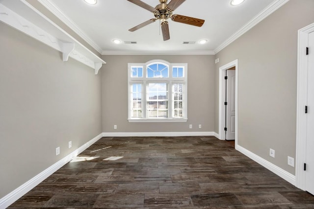 unfurnished room with wood finished floors, visible vents, baseboards, and ornamental molding