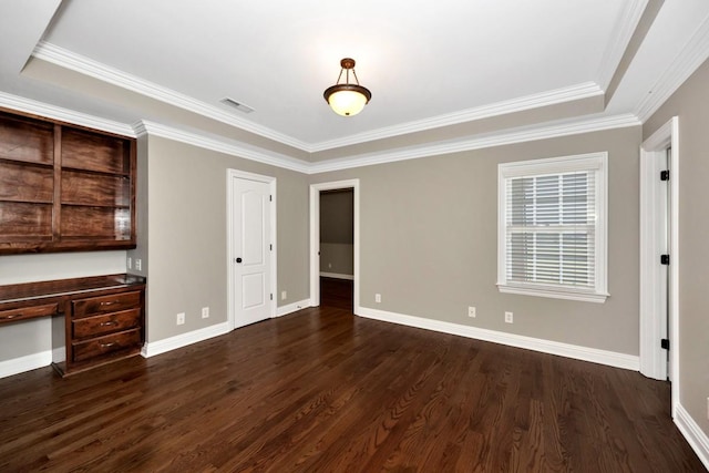 unfurnished living room featuring visible vents, crown molding, dark wood-type flooring, baseboards, and built in study area