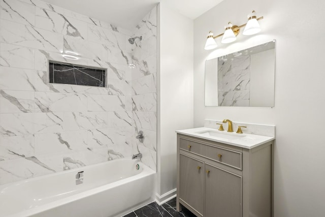 full bathroom featuring shower / tub combination, marble finish floor, and vanity