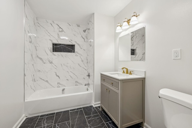 bathroom featuring toilet, marble finish floor, shower / bath combination, baseboards, and vanity