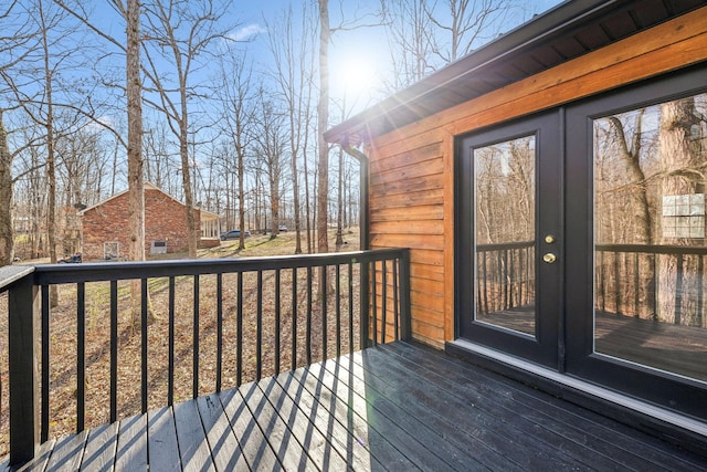 wooden terrace featuring french doors