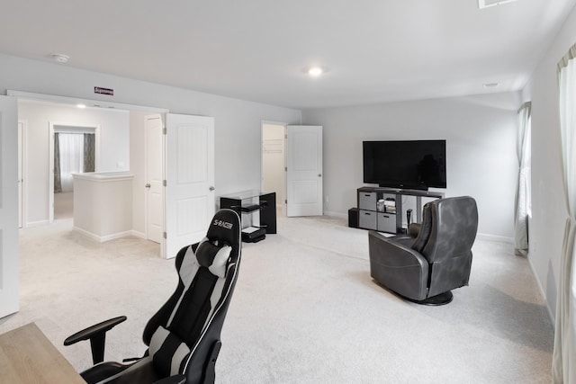 interior space with baseboards and carpet