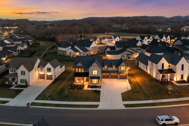 aerial view at dusk with a residential view