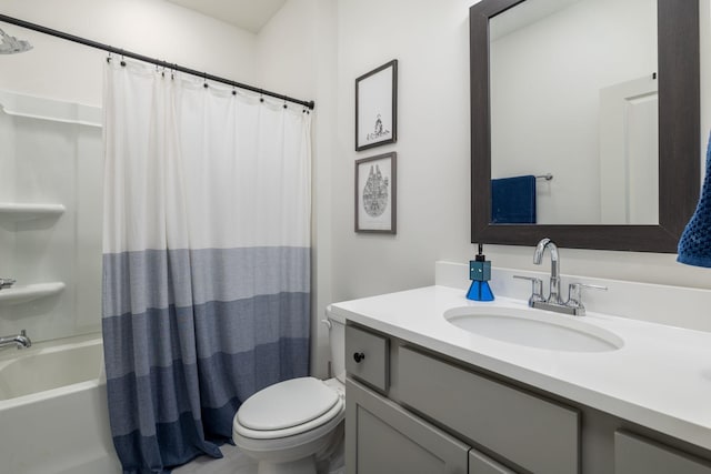 bathroom featuring shower / bath combo with shower curtain, toilet, and vanity