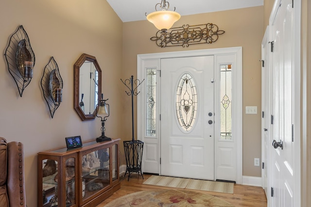 entrance foyer with plenty of natural light and light wood-type flooring